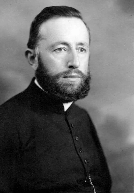 Portrait of Father Denis Doucet with a beard
