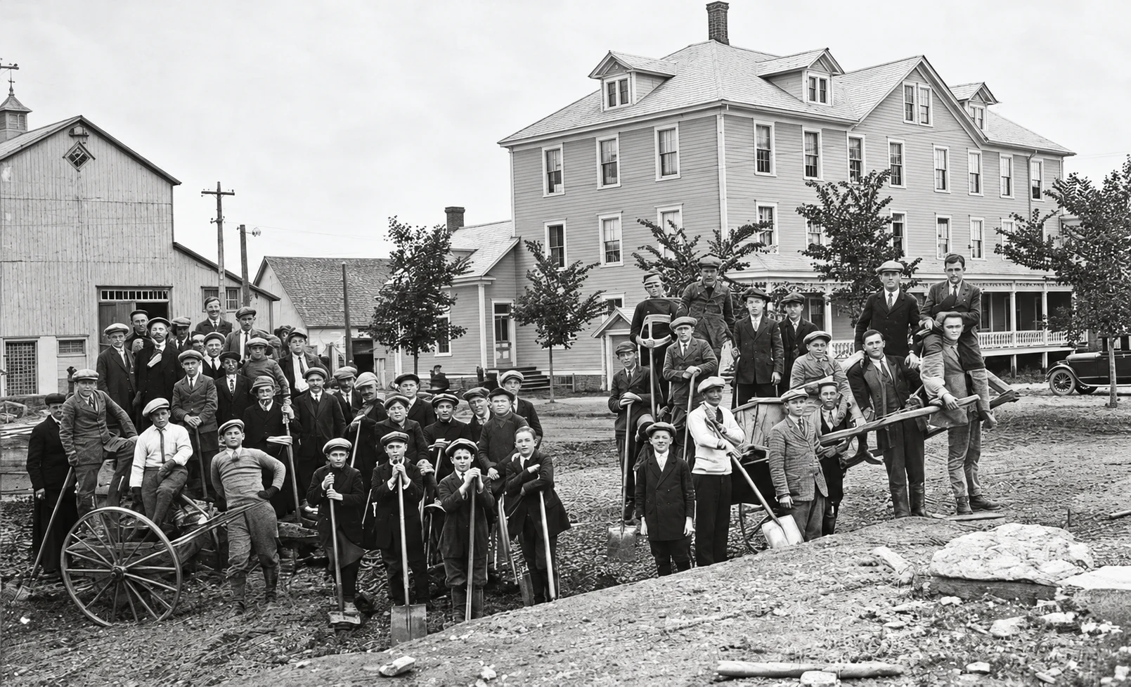 Juvenists digging a skating rink